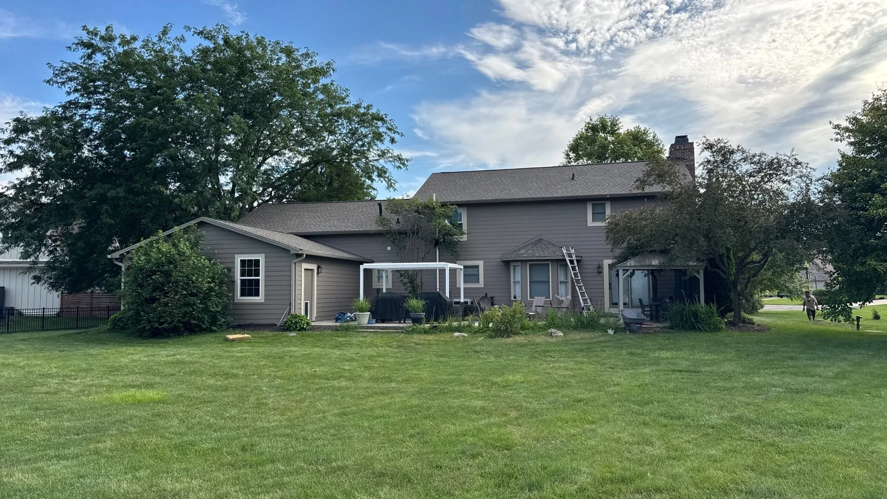 Completed GAF Timberline HDZ Weathered Wood roof replacement on a Zionsville home